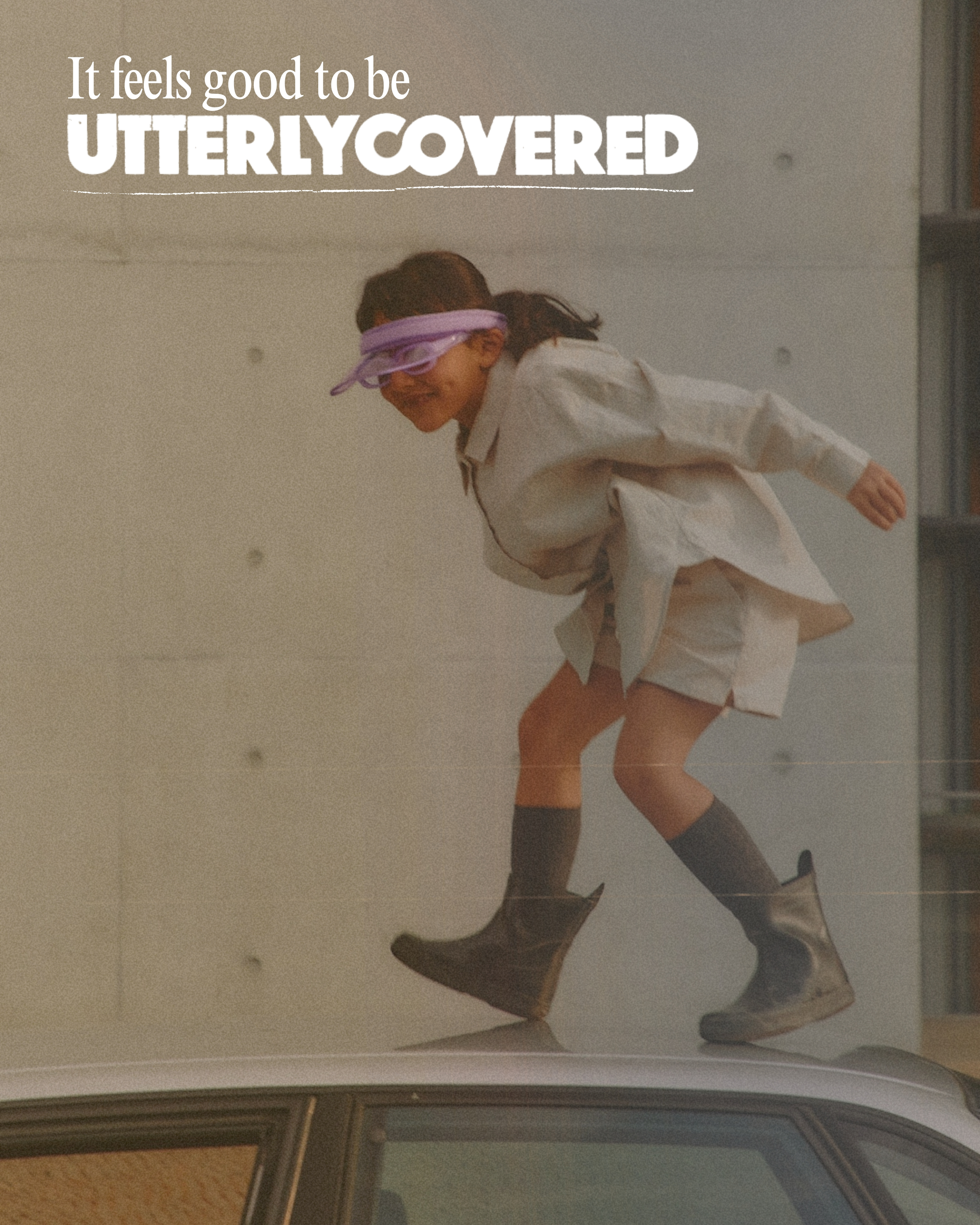 Two friends enjoying summer with UtterlyCovered branding - It feels good to be protected with car insurance