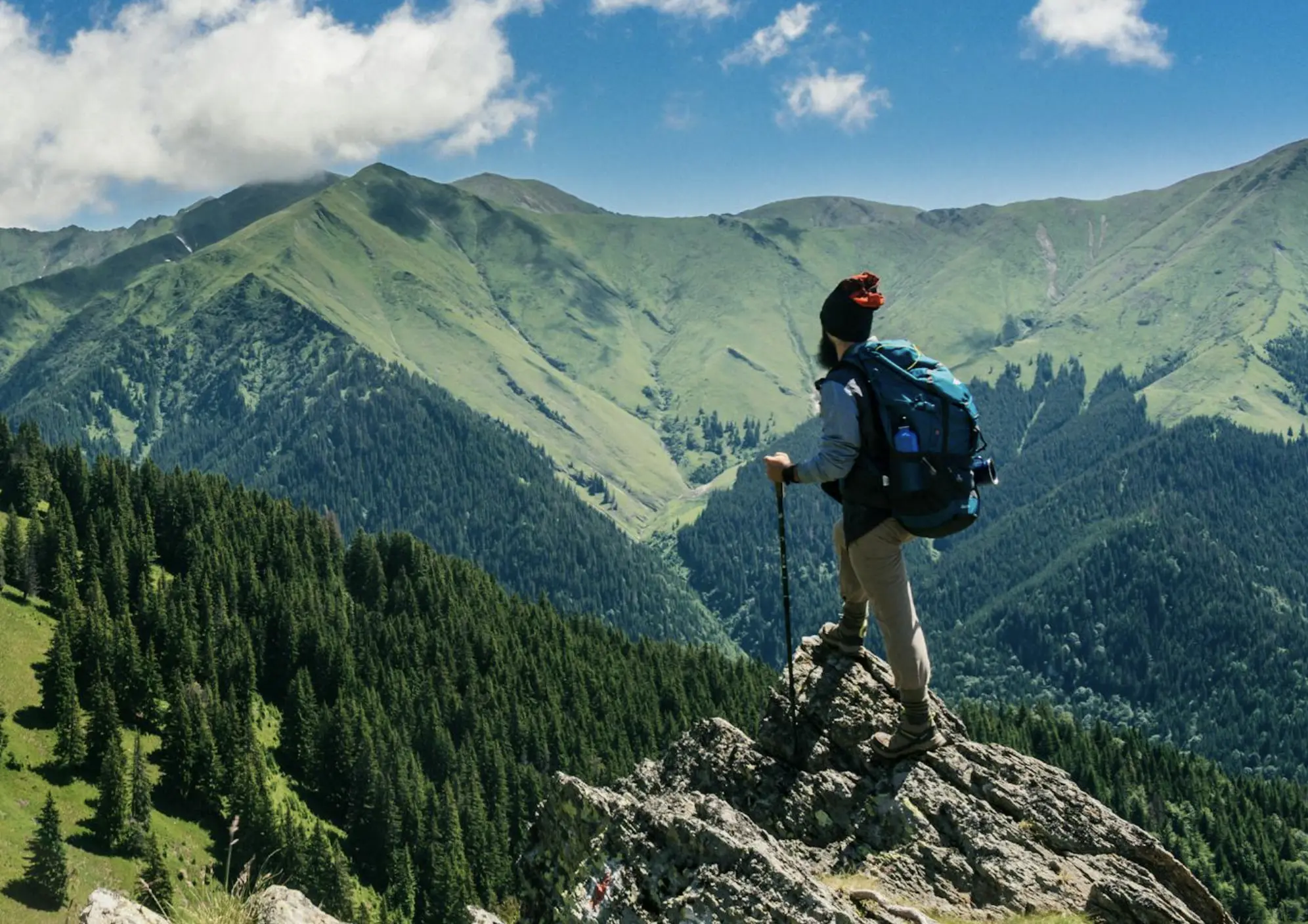 Hiker enjoying mountain adventure travel